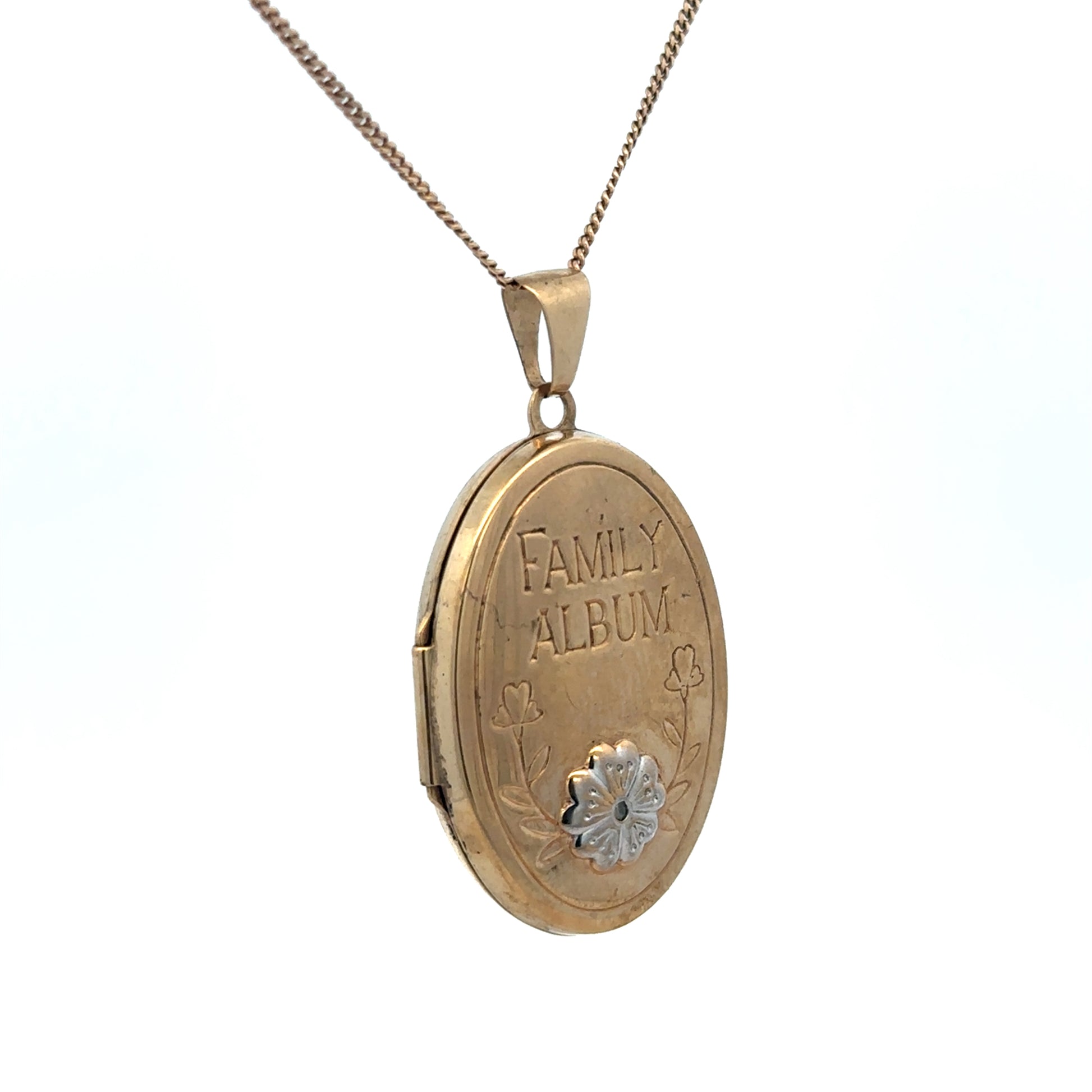 9ct yellow gold locket pendant with intricate detailing, weighing 5.8g, by Reeves and Sons, shown with a close-up of the front design.