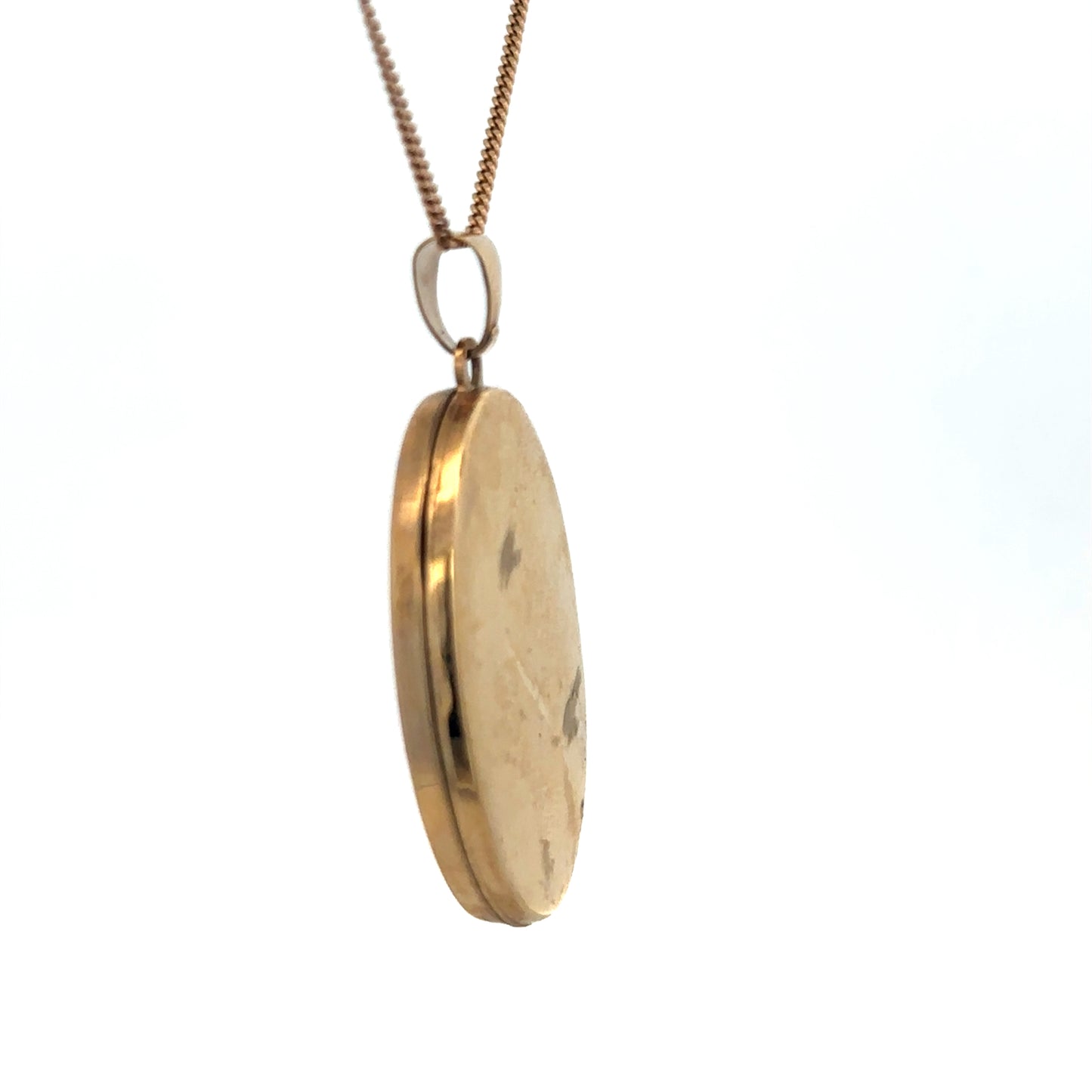 9ct yellow gold locket pendant by Reeves and Sons, featuring a polished, classic design with a secure bail for chain attachment.