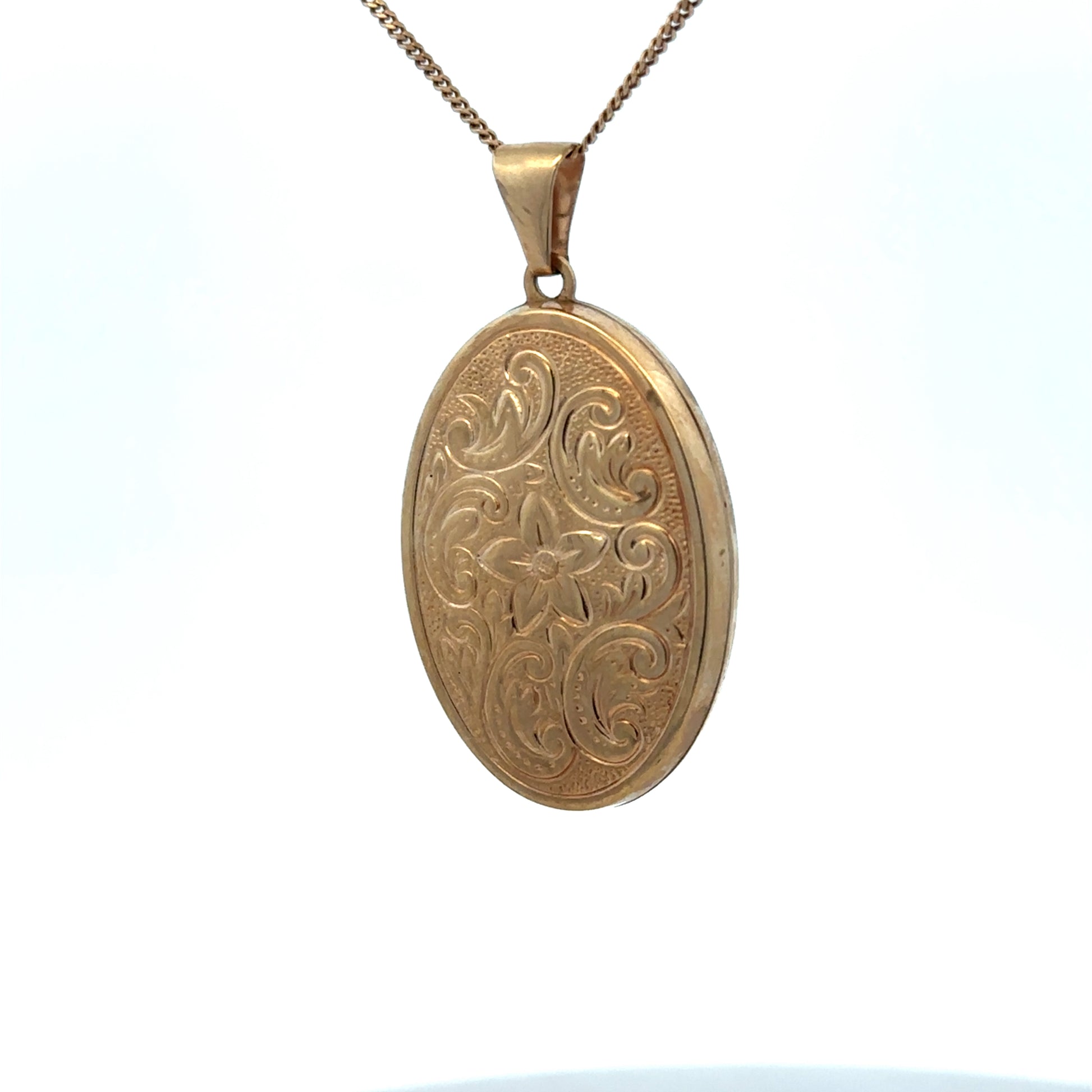 9ct yellow gold locket pendant by Reeves and Sons, 4.4g, showcasing a detailed, vintage-style jewelry piece with a polished finish.