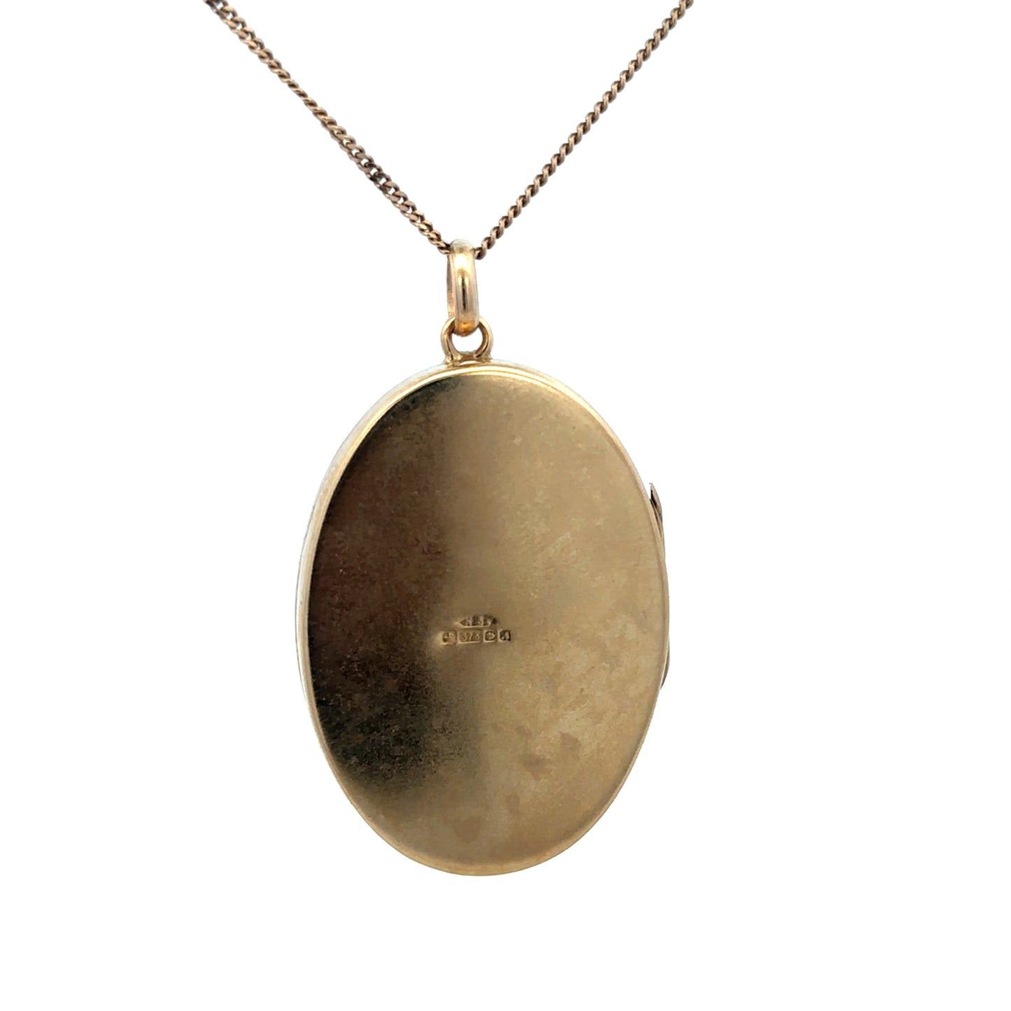 9ct yellow gold locket pendant by Reeves and Sons, showcasing a detailed, polished gold design with a secure bail.