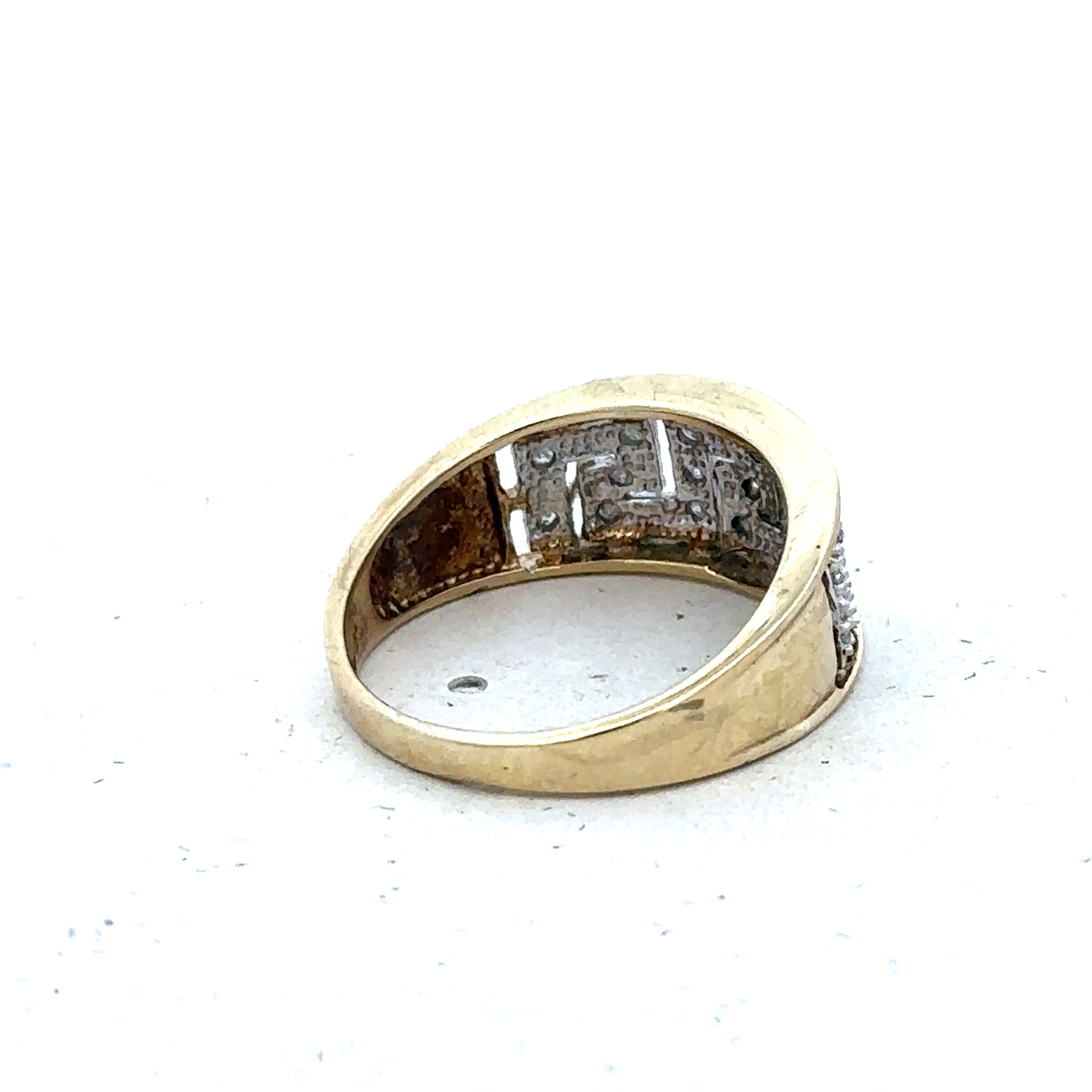 9ct yellow gold diamond ring in size O with sparkling diamonds, crafted by Reeves and Sons, displayed on a neutral background.