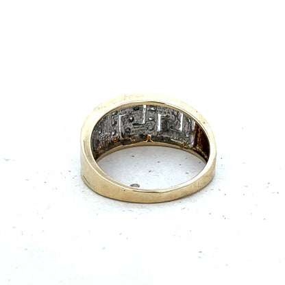 9ct yellow gold diamond ring with a central diamond and intricate band design, size O, by Reeves and Sons.