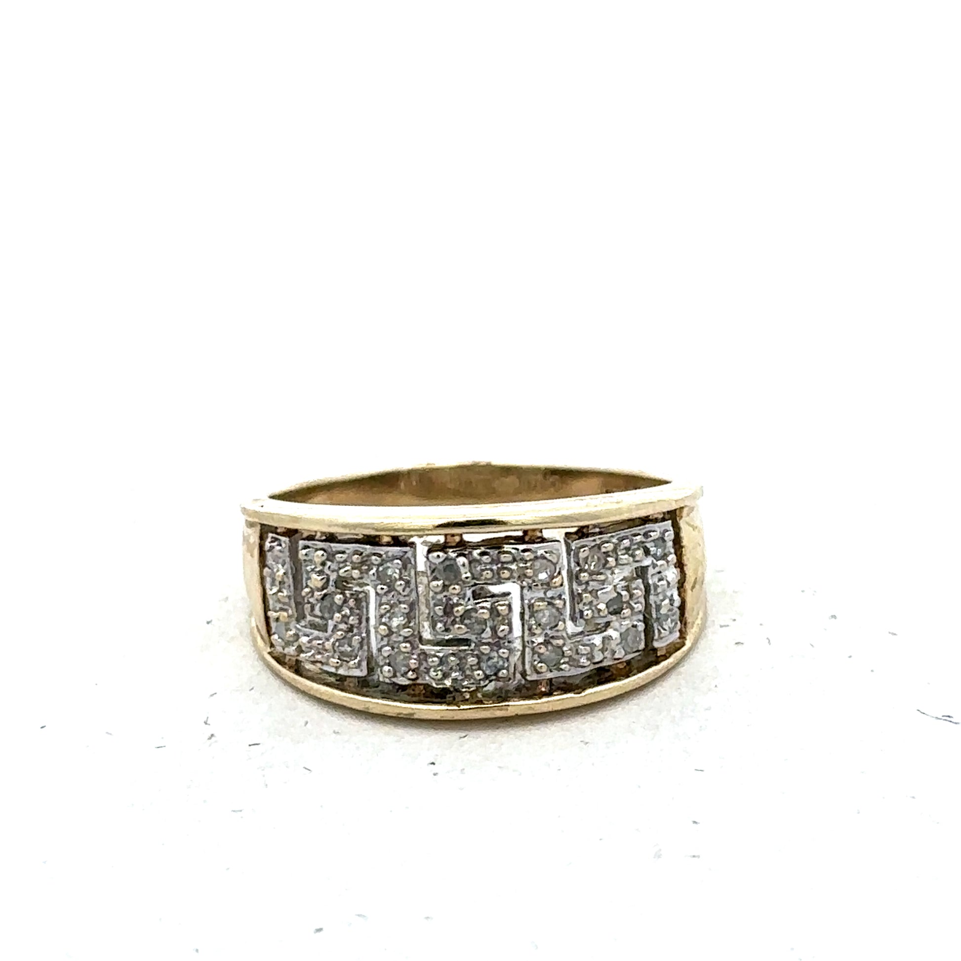 9ct yellow gold diamond ring in size O with sparkling diamonds, crafted by Reeves and Sons, shown on a plain background.