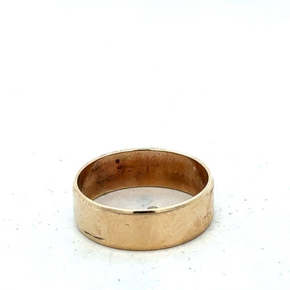 9ct yellow gold band ring in size P1/2, smooth polished finish, crafted by Reeves and Sons, shown on a neutral background.