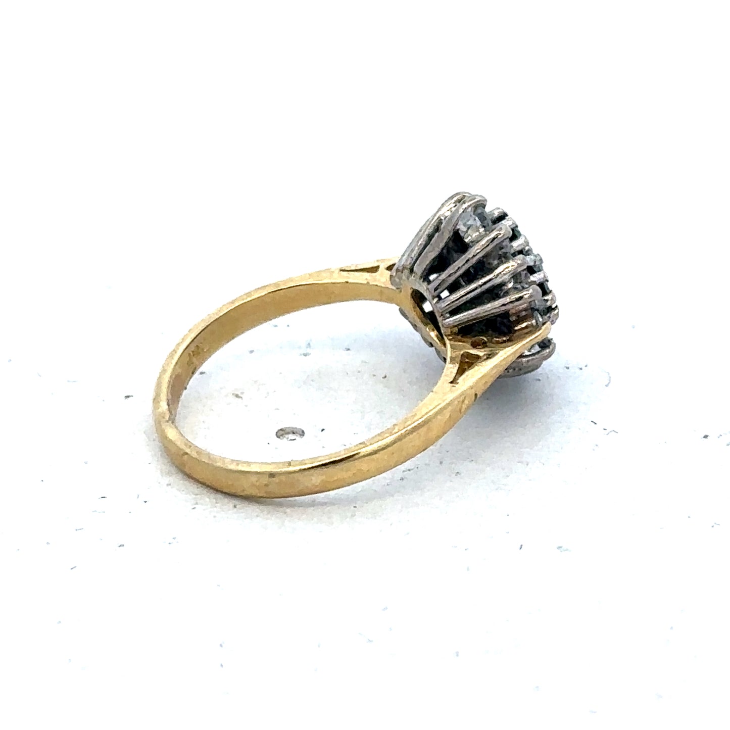 18ct yellow gold ring with diamonds and sapphires, size H, from Reeves and Sons, showcasing the detailed gemstone setting.