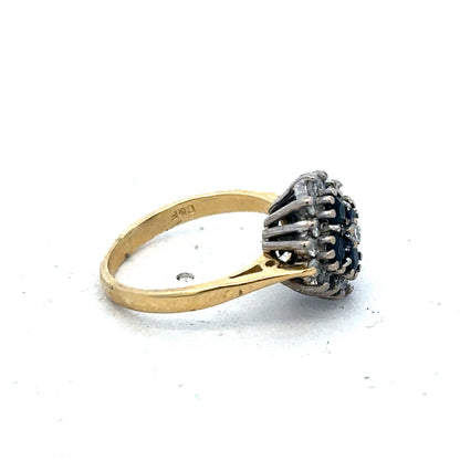 18ct yellow gold diamond and sapphire ring with size H, featuring a detailed design by Reeves and Sons.