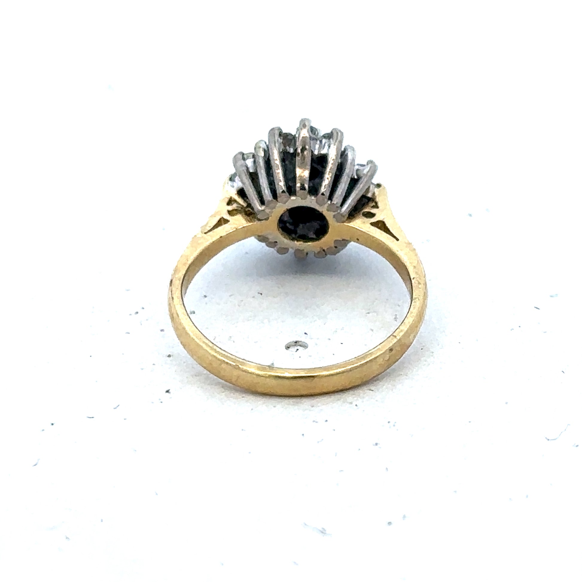 18ct yellow gold diamond and sapphire ring, size H, with intricate design, by Reeves and Sons.