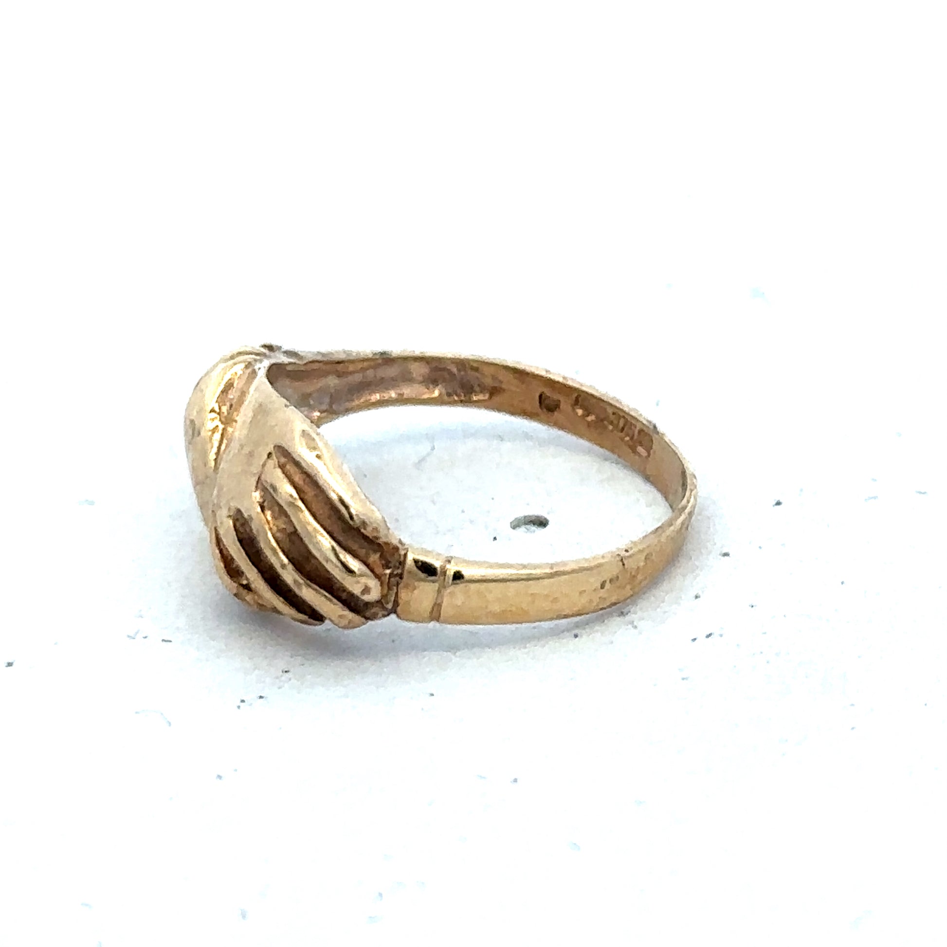 9ct yellow gold ring in size L1/2 with a smooth band, crafted by Reeves and Sons.