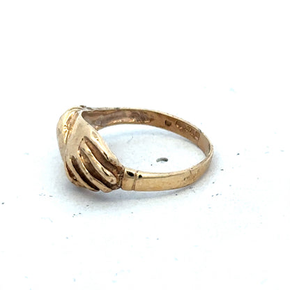 9ct yellow gold ring in size L1/2 with a smooth band, crafted by Reeves and Sons.