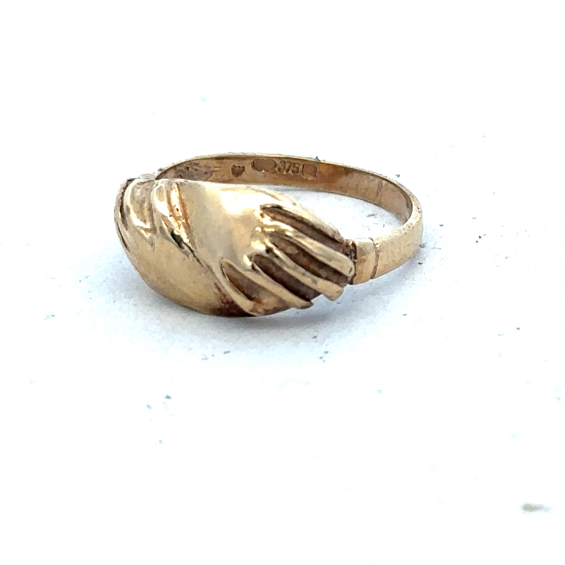 9ct yellow gold ring in size L1/2 from Reeves and Sons, featuring a polished band and classic design.