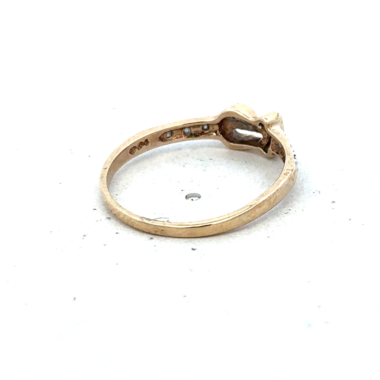 9ct yellow gold buckle ring in size M 1/2, featuring a polished buckle design, by Reeves and Sons.