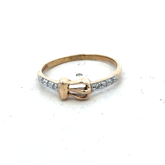 9ct yellow gold buckle ring in size M 1/2 with a polished finish, featuring a textured buckle design, by Reeves and Sons.