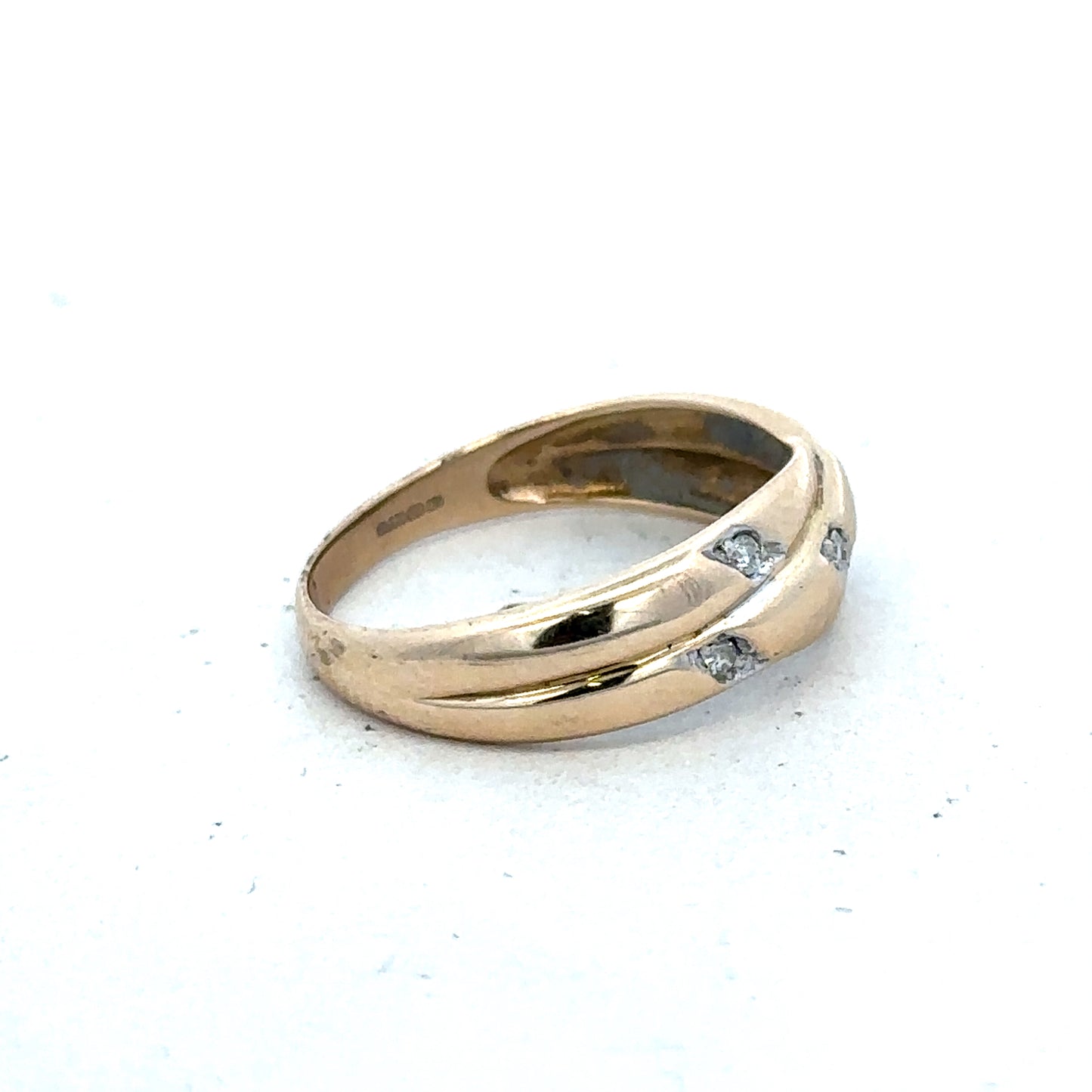 9ct yellow gold diamond ring in size P by Reeves and Sons, featuring a sparkling diamond setting and elegant design.