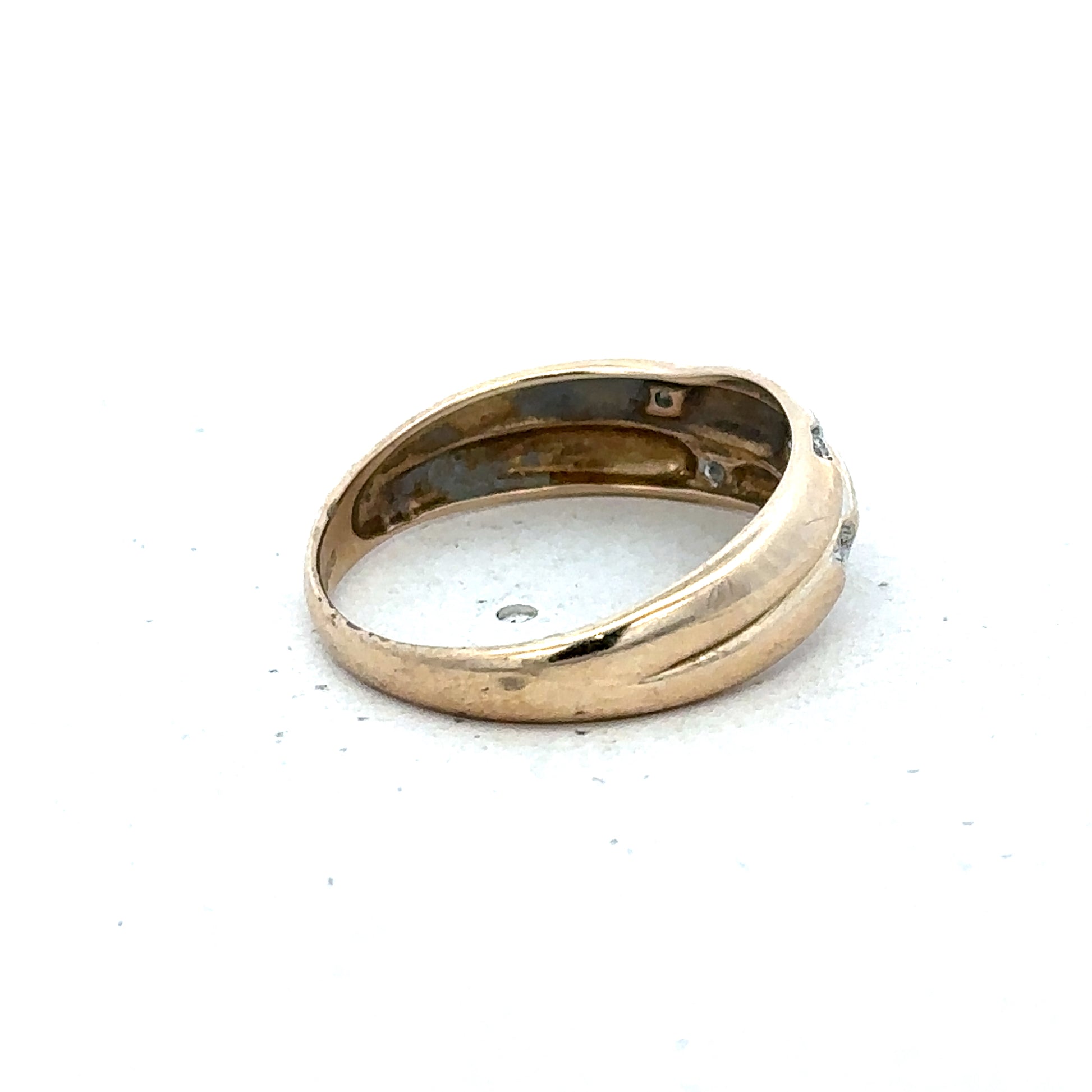 9ct yellow gold diamond ring with intricate design, size P, crafted by Reeves and Sons, featuring sparkling diamonds on the band.