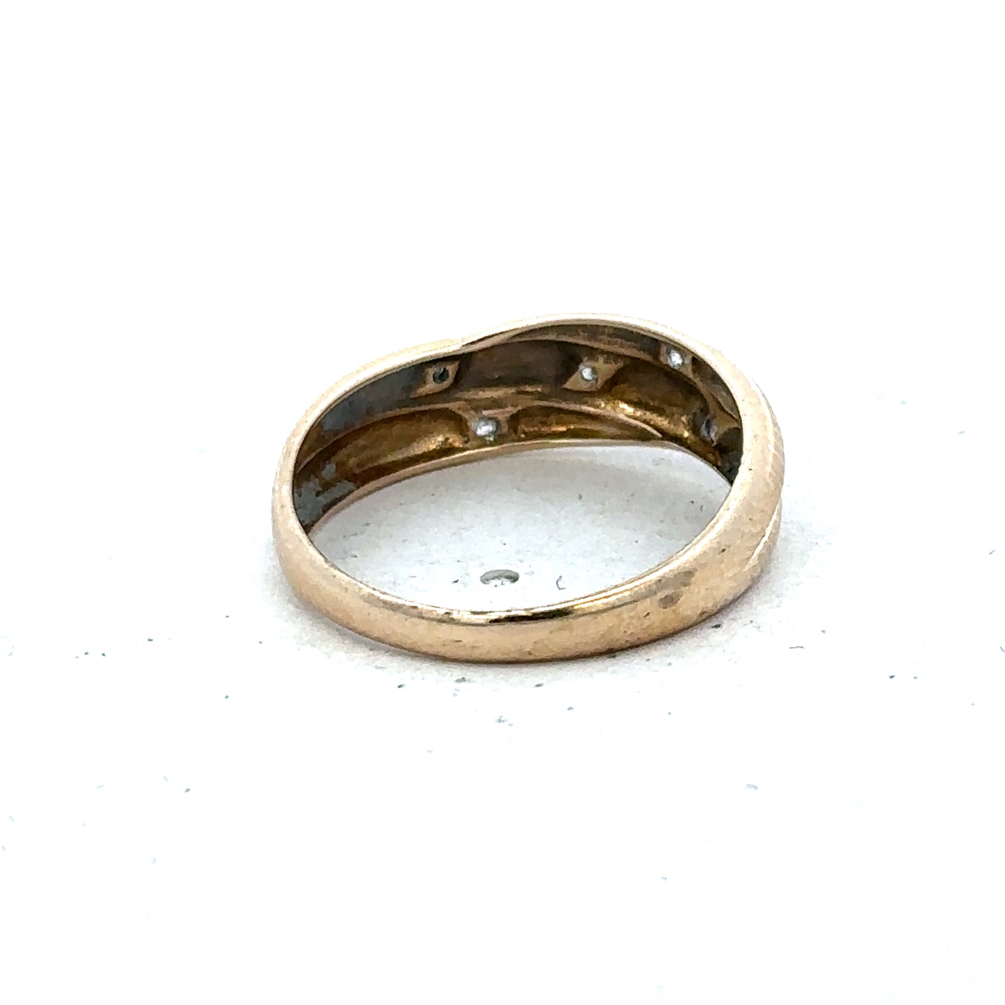9ct yellow gold diamond ring in size P by Reeves and Sons, featuring a sparkling diamond setting on a polished band.