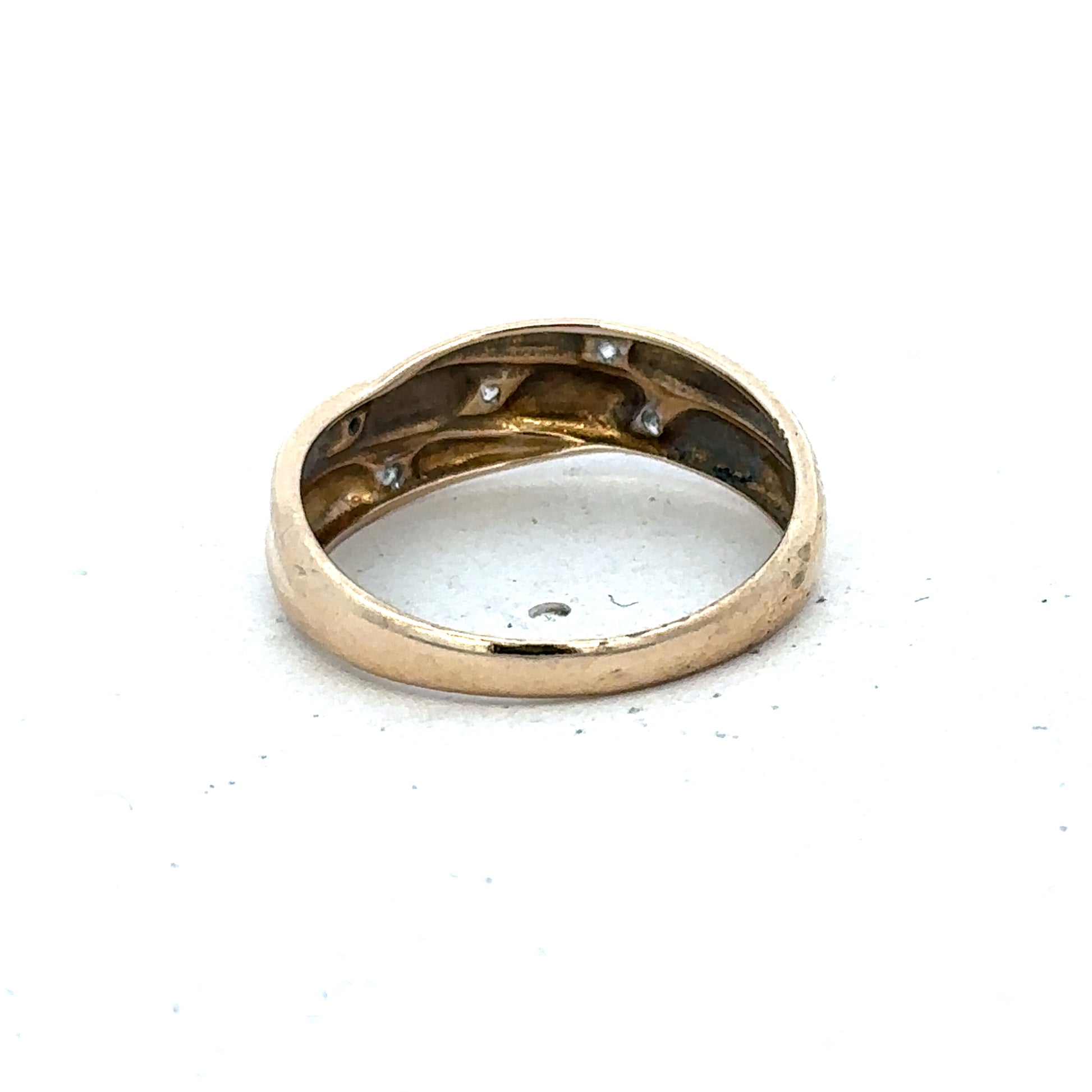 9ct yellow gold diamond ring in size P with sparkling diamonds, crafted by Reeves and Sons, displayed on a plain background.