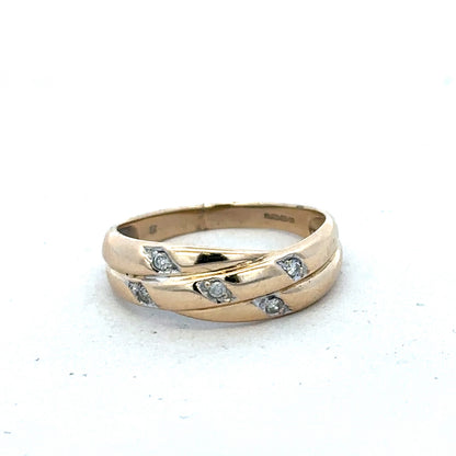 9ct yellow gold diamond ring with intricate design, size P, crafted by Reeves and Sons, featuring sparkling diamonds on a polished band.