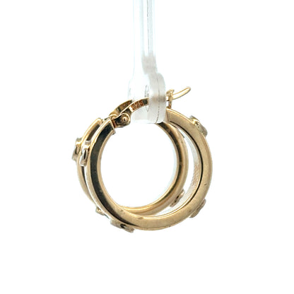 Reeves and Sons 9ct yellow gold hoop earrings, lightweight 2.9g, with classic circular design, visible in the image.