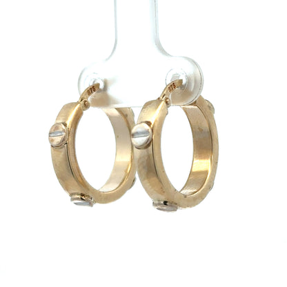9ct yellow gold hoop earrings weighing 2.9g with a classic round design by Reeves and Sons, shown in close-up.