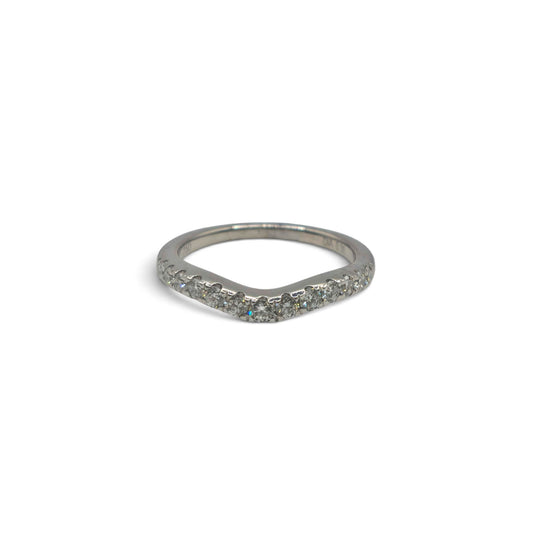 18ct white gold curved half eternity ring with sparkling diamonds from Reeves and Sons, showcasing elegant design and fine craftsmanship.