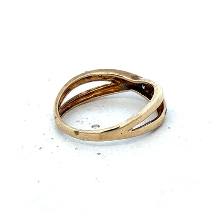 9ct yellow gold ring in size N, Reeves and Sons, showcasing a polished band on a plain background.
