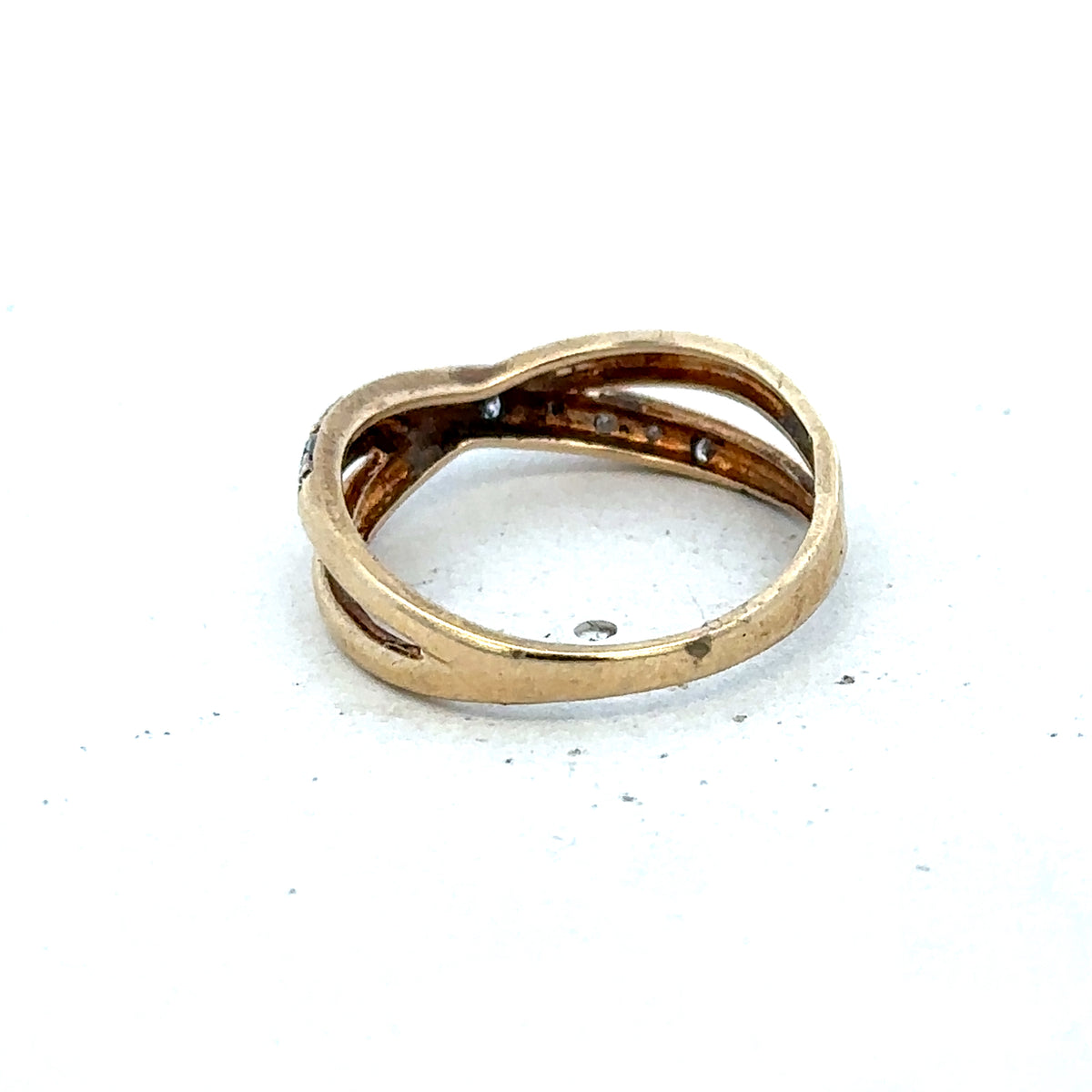 9ct yellow gold ring in size N from Reeves and Sons, featuring a smooth polished band and classic design.