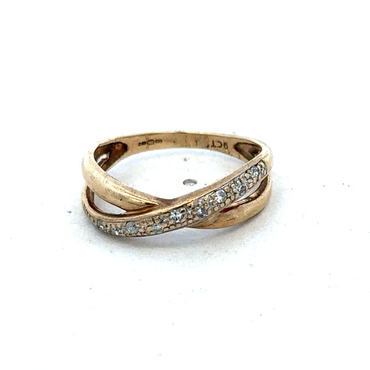 9ct yellow gold ring in size N from Reeves and Sons, showcasing a smooth, polished band with subtle shine.