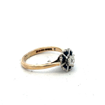 9ct yellow gold ring size J from Reeves and Sons, showcasing a polished band with a smooth, shiny finish.