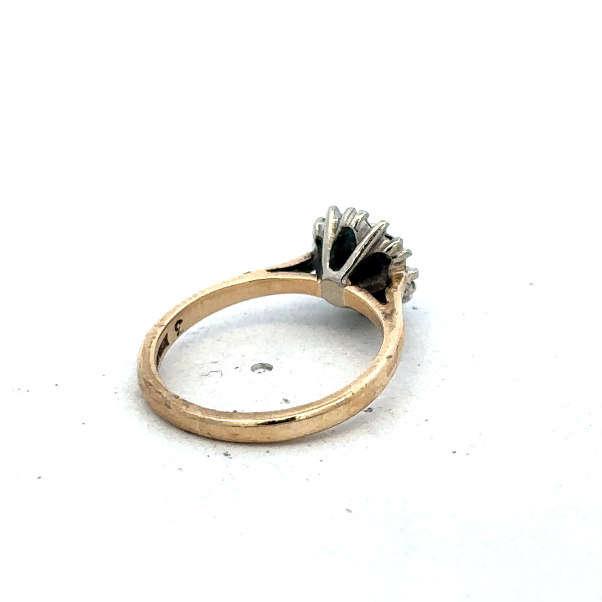 9ct yellow gold ring in size J by Reeves and Sons, featuring a smooth polished band and elegant design.