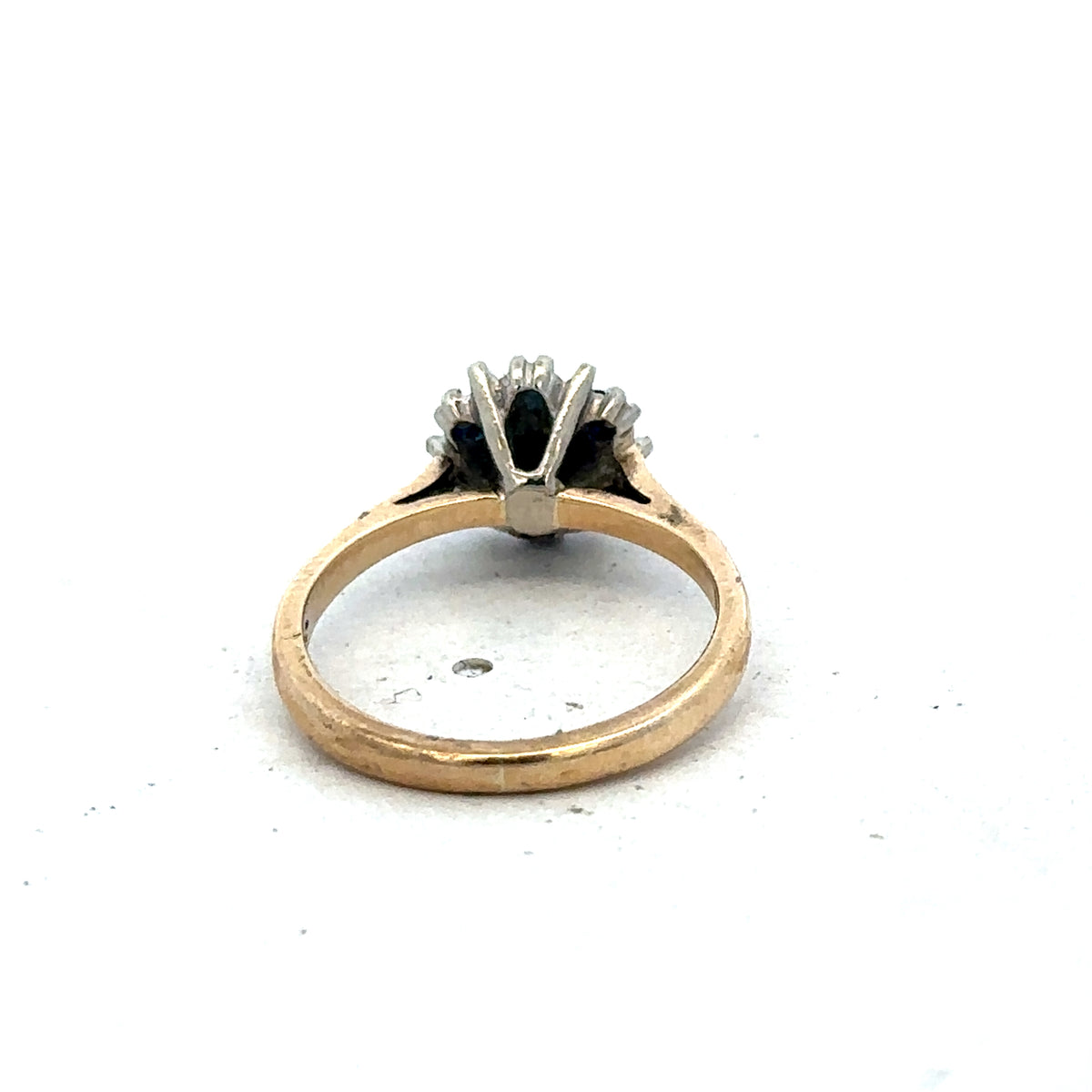 9ct yellow gold ring in size J by Reeves and Sons, featuring a smooth polished band.