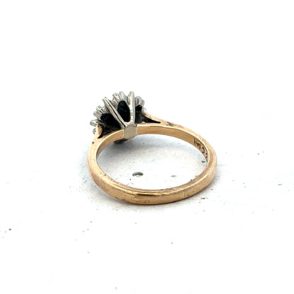 9ct yellow gold ring in size J by Reeves and Sons, showcasing a smooth, polished band with a classic design.