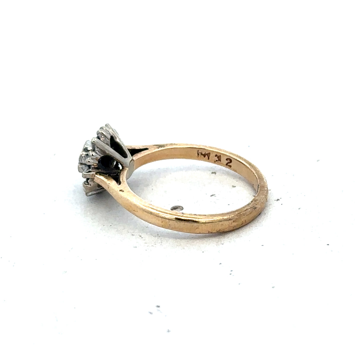 9ct yellow gold ring in size J with a smooth band, crafted by Reeves and Sons.