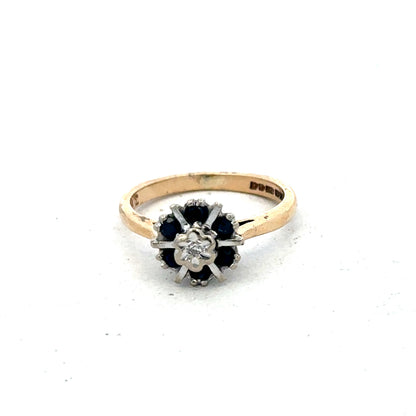 9ct yellow gold ring in size J by Reeves and Sons, showcasing a smooth polished band.