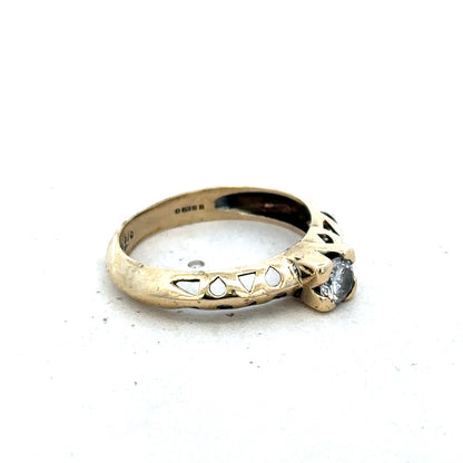 9ct yellow gold ring in size M with a smooth band, crafted by Reeves and Sons.