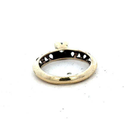 9ct yellow gold ring in size M with a smooth band, crafted by Reeves and Sons.