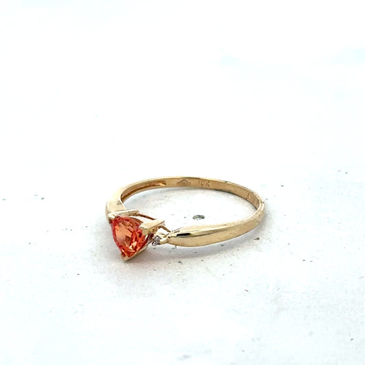 9ct yellow gold ring size N1/2 by Reeves and Sons, featuring a smooth polished band, shown in close-up image.