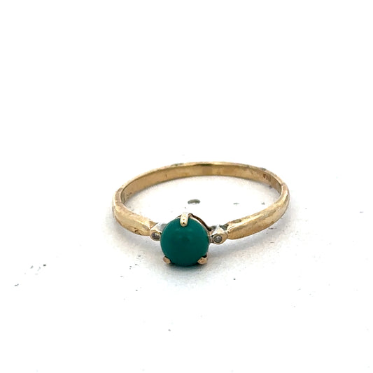 9ct yellow gold ring in size S with a smooth band, crafted by Reeves and Sons, shown on a neutral background