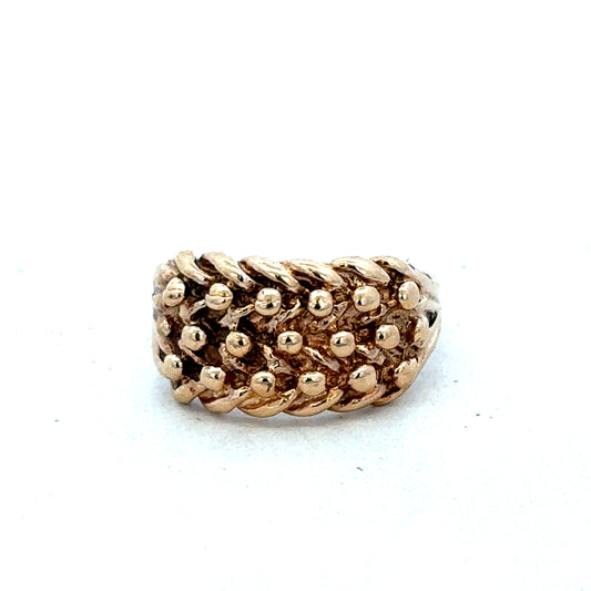 9ct yellow gold keeper ring in size N1/2 with a smooth band, crafted by Reeves and Sons.