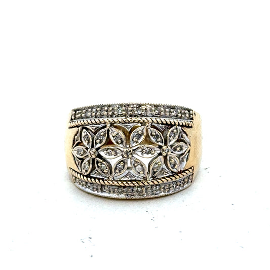 9ct yellow and white gold diamond ring by Reeves and Sons, showcasing a sparkling diamond set in a elegant gold band.