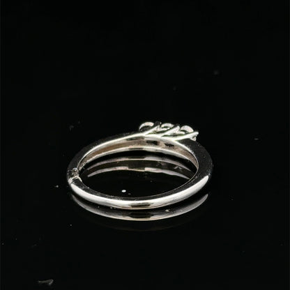 18ct white gold diamond ring by Reeves and Sons featuring sparkling diamonds and elegant design.