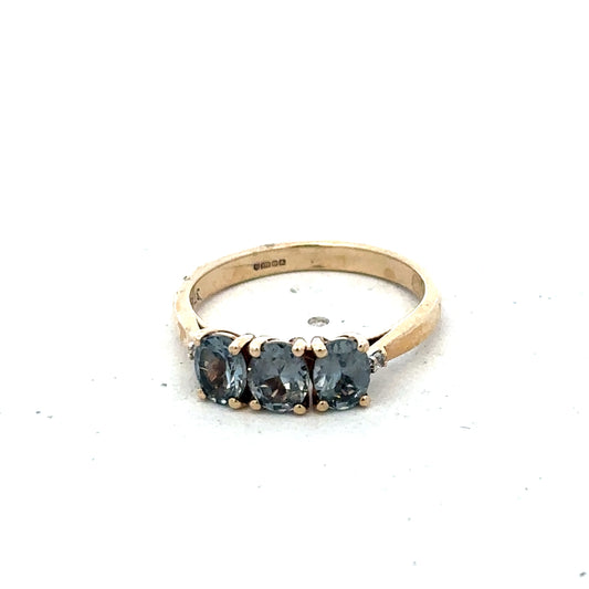 9ct yellow gold ring in size L with a smooth band, crafted by Reeves and Sons, displayed on a neutral background.
