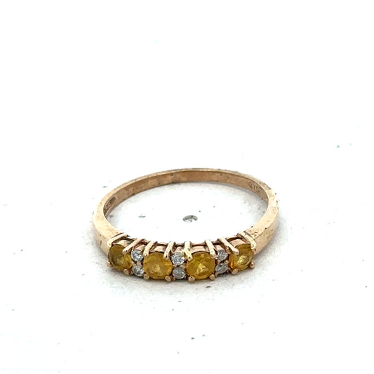 9ct yellow gold ring size N by Reeves and Sons, featuring a smooth polished band on a white background.