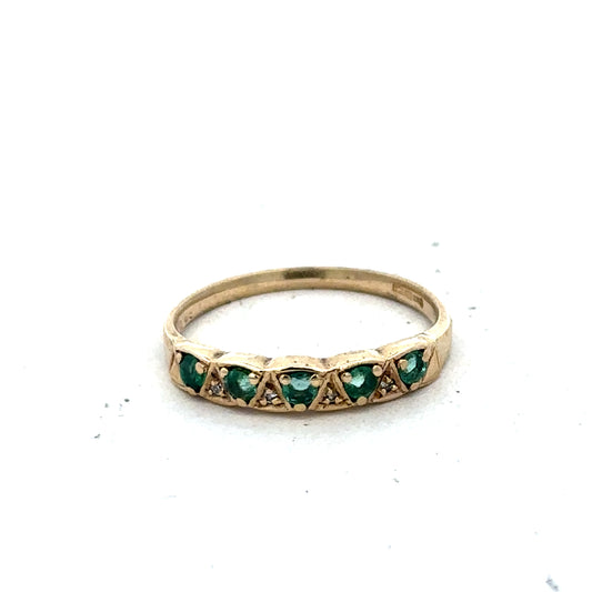 9ct yellow gold ring in size N1/2 with a smooth band, crafted by Reeves and Sons, shown on a plain background.