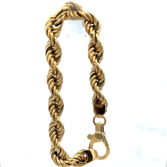 9ct yellow gold rope bracelet by Reeves and Sons, 25.6g, featuring a textured twisted design and secure clasp.