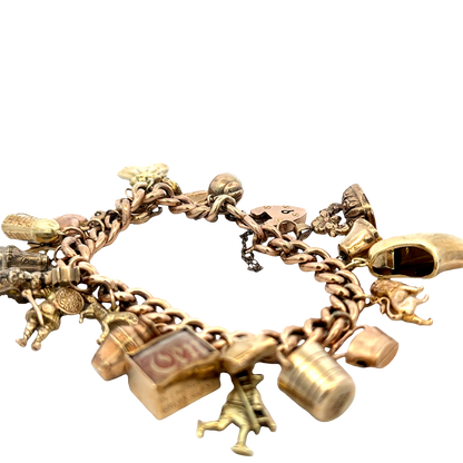 9ct yellow gold charm bracelet 46.8g (sh27587b)