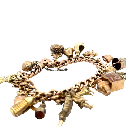 9ct yellow gold charm bracelet 46.8g (sh27587b)