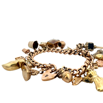 9ct yellow gold charm bracelet 46.8g (sh27587b)