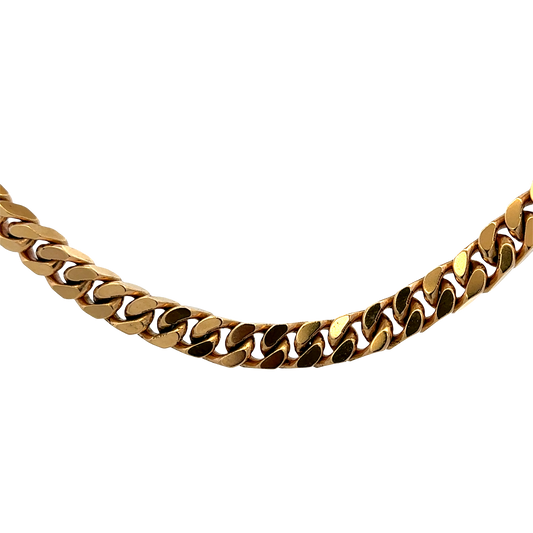 9ct yellow gold curb chain bracelet with a polished finish, weighing 108.2g, from Reeves and Sons.
