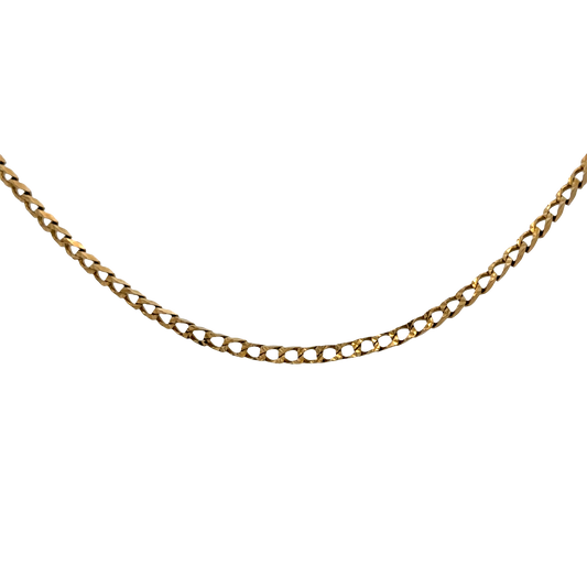 Reeves and Sons 9ct yellow gold curb chain, 6.9g, close-up showing polished links and detailed craftsmanship.