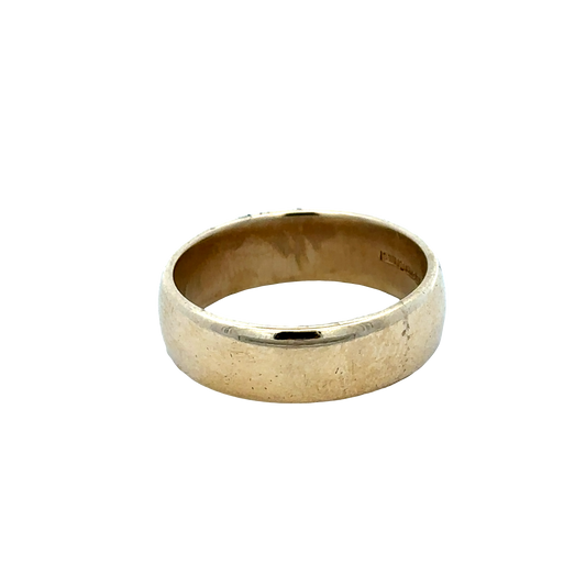9ct yellow gold band ring in size U by Reeves and Sons, close-up view showing smooth polished surface and classic design.